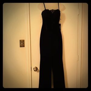 Black romper with black lace on top